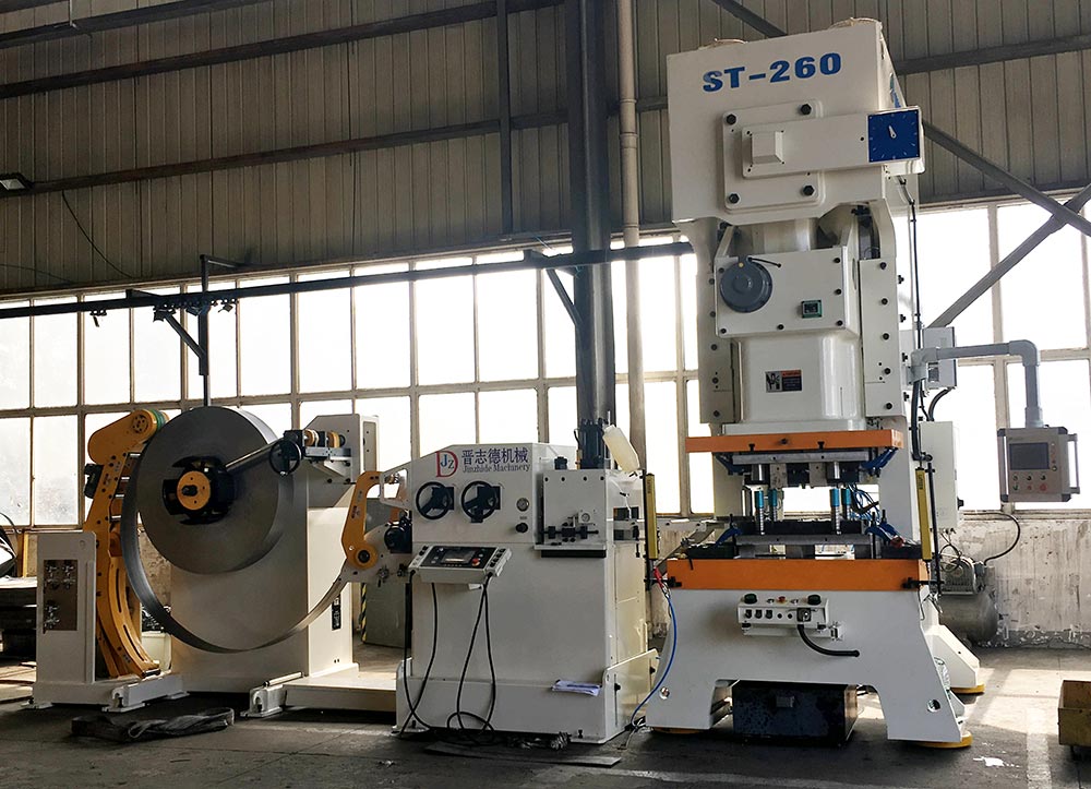 三合一送料機應(yīng)用,汽車減震器彈簧底座沖壓